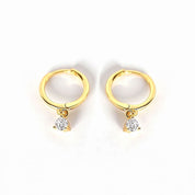 Gold diamond huggie earrings