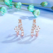 Rose gold huggie hoop earrings 
