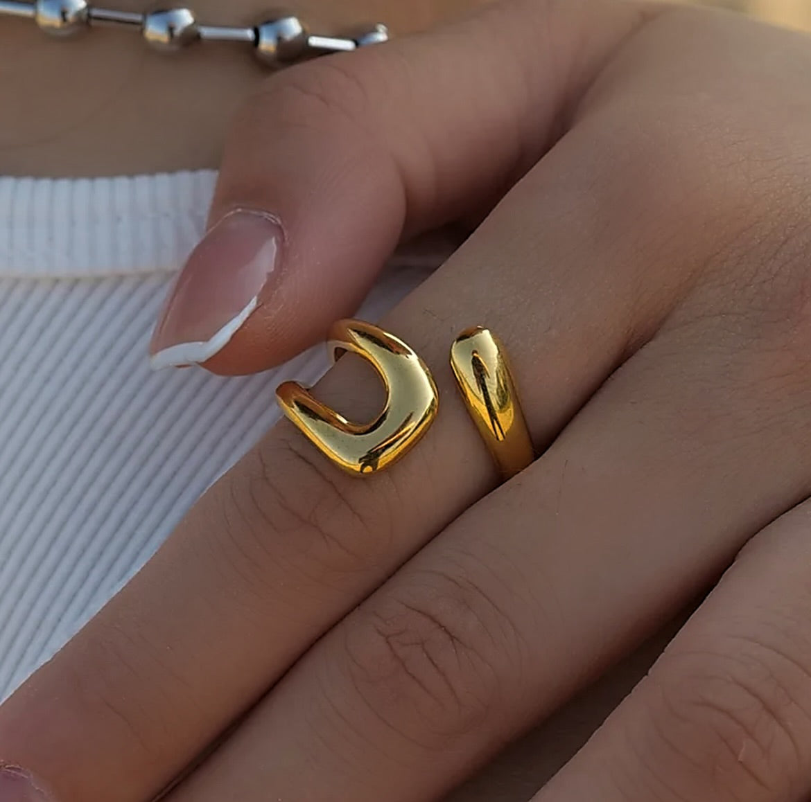Gold curve ring