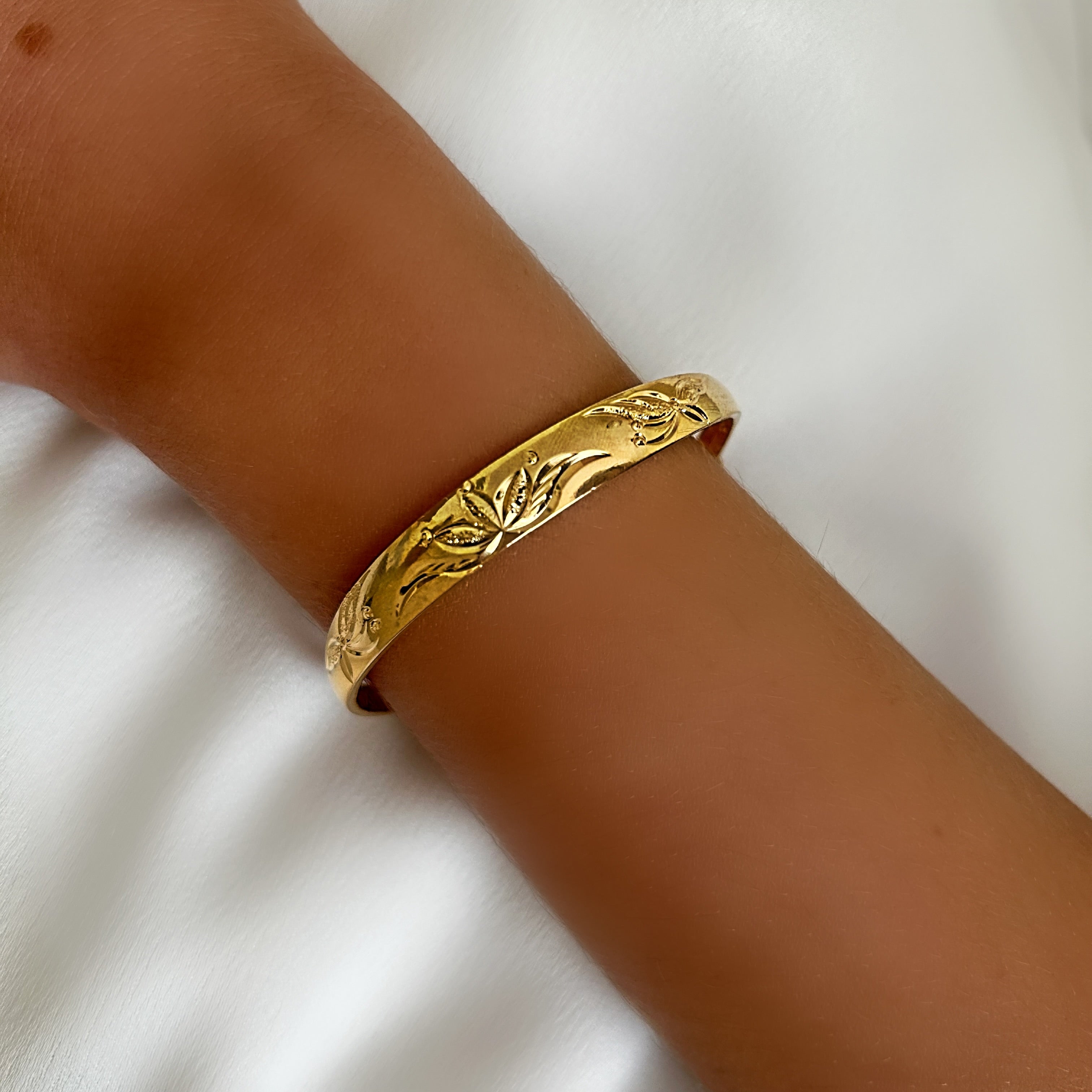 Gold lotus bangle