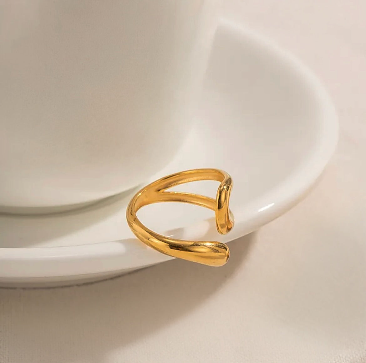 Gold curve ring