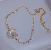 Crescent moon tennis bracelet