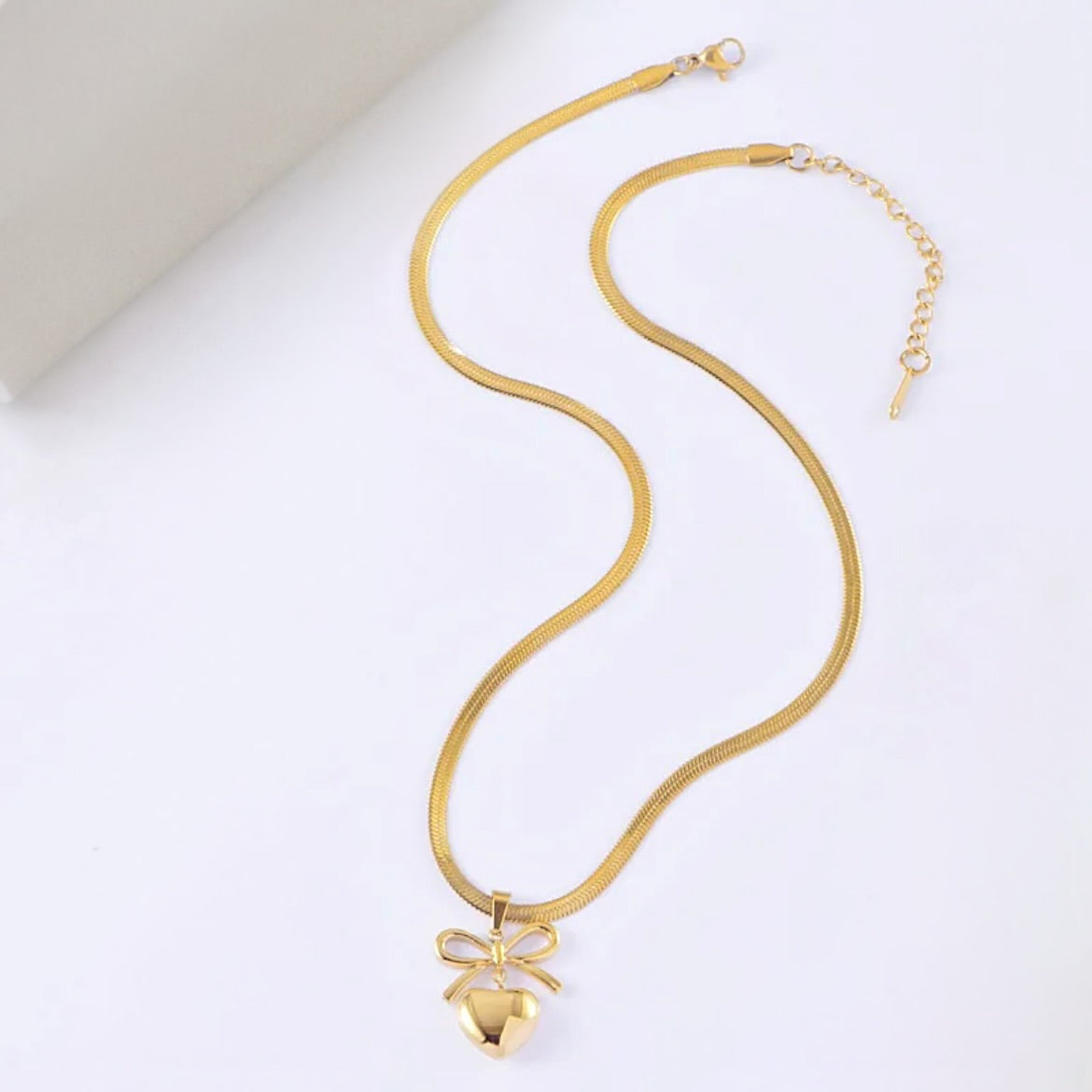 Bow heart necklace