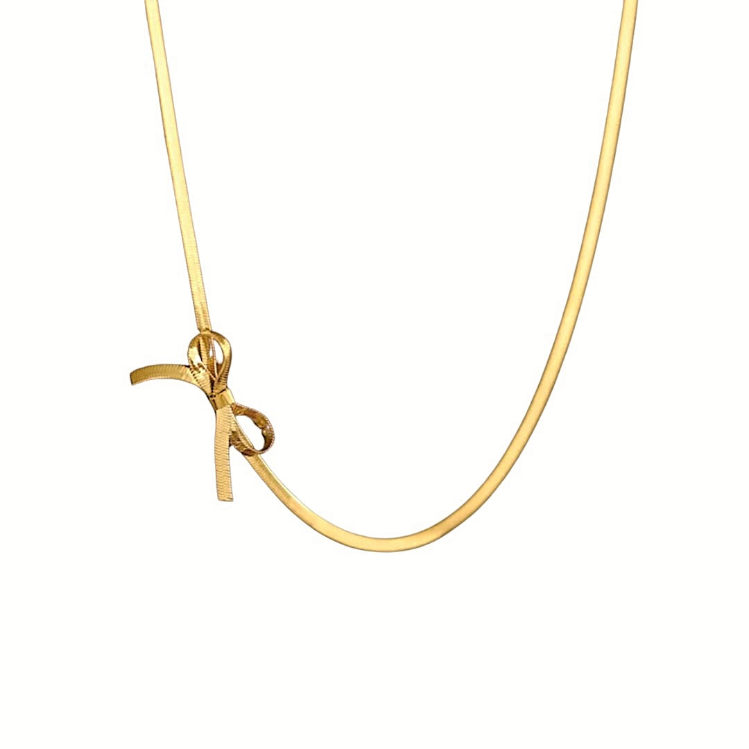 Gold bow necklace