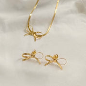 Gold bow necklace