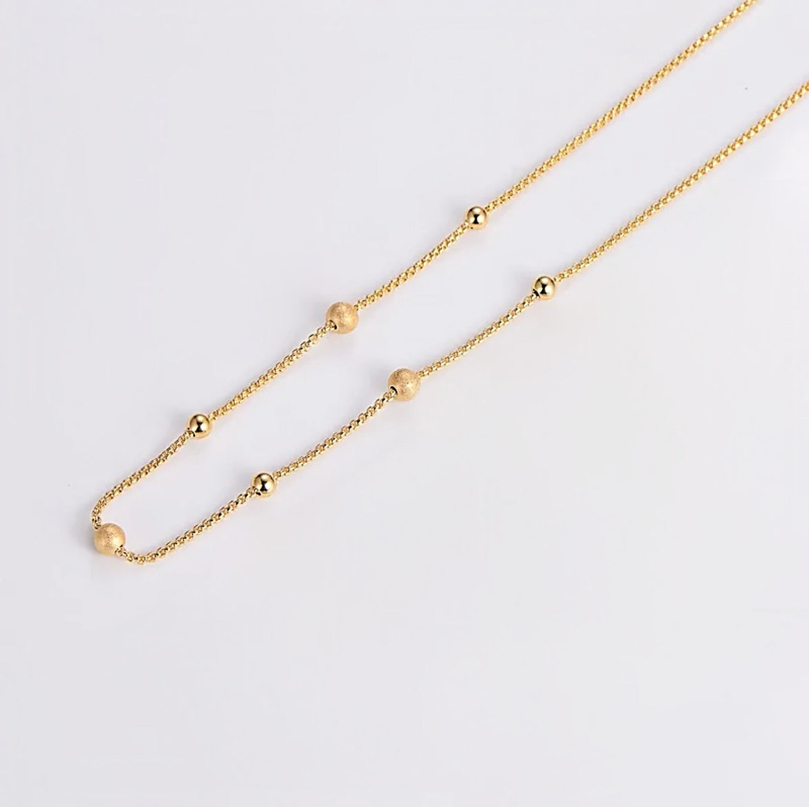 Gold dot necklace
