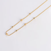 Gold dot necklace