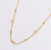 Gold dot necklace