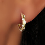 Diamond huggie earrings gold