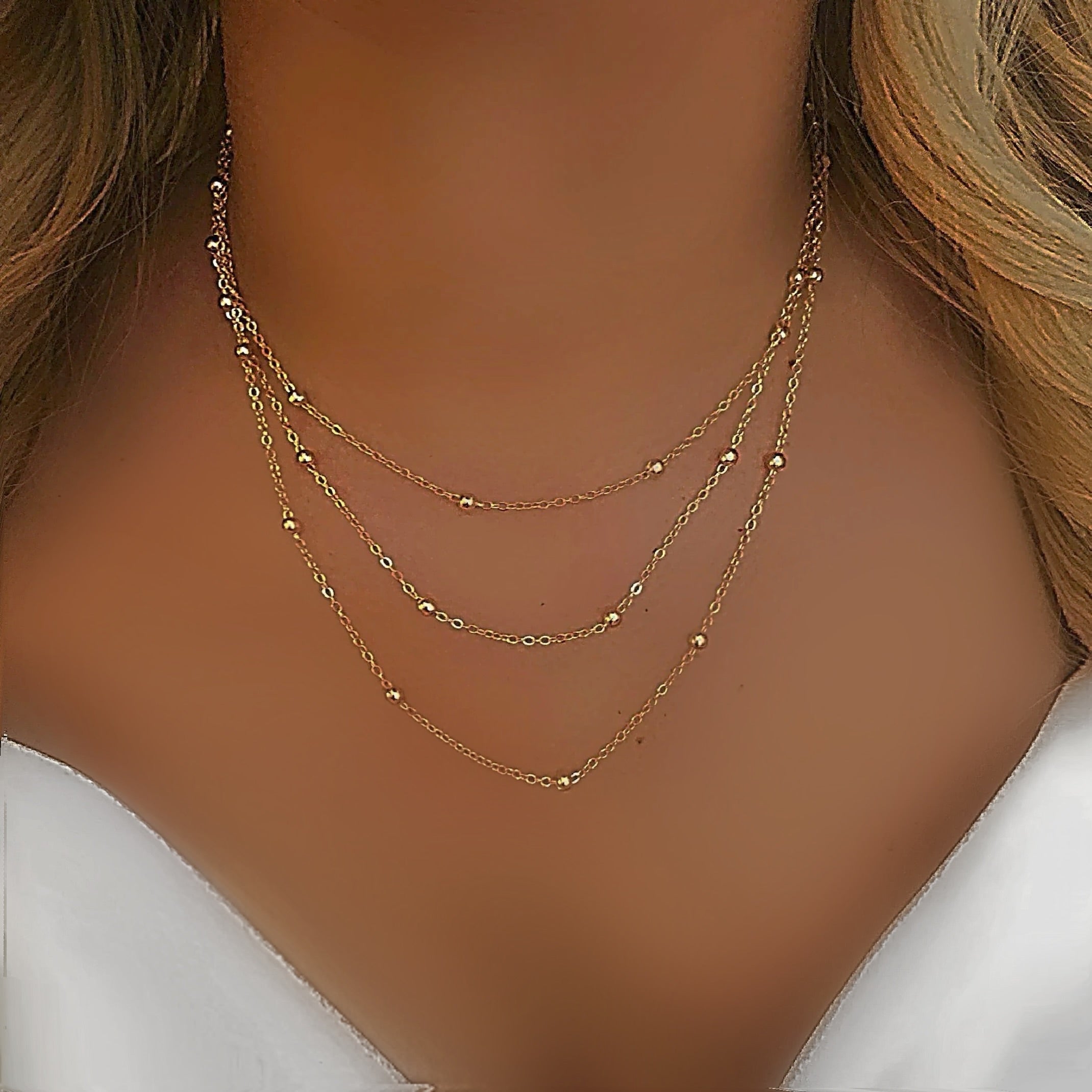 Dainty gold bead layered necklace 