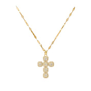 Gold cross necklace with diamonds on a white background