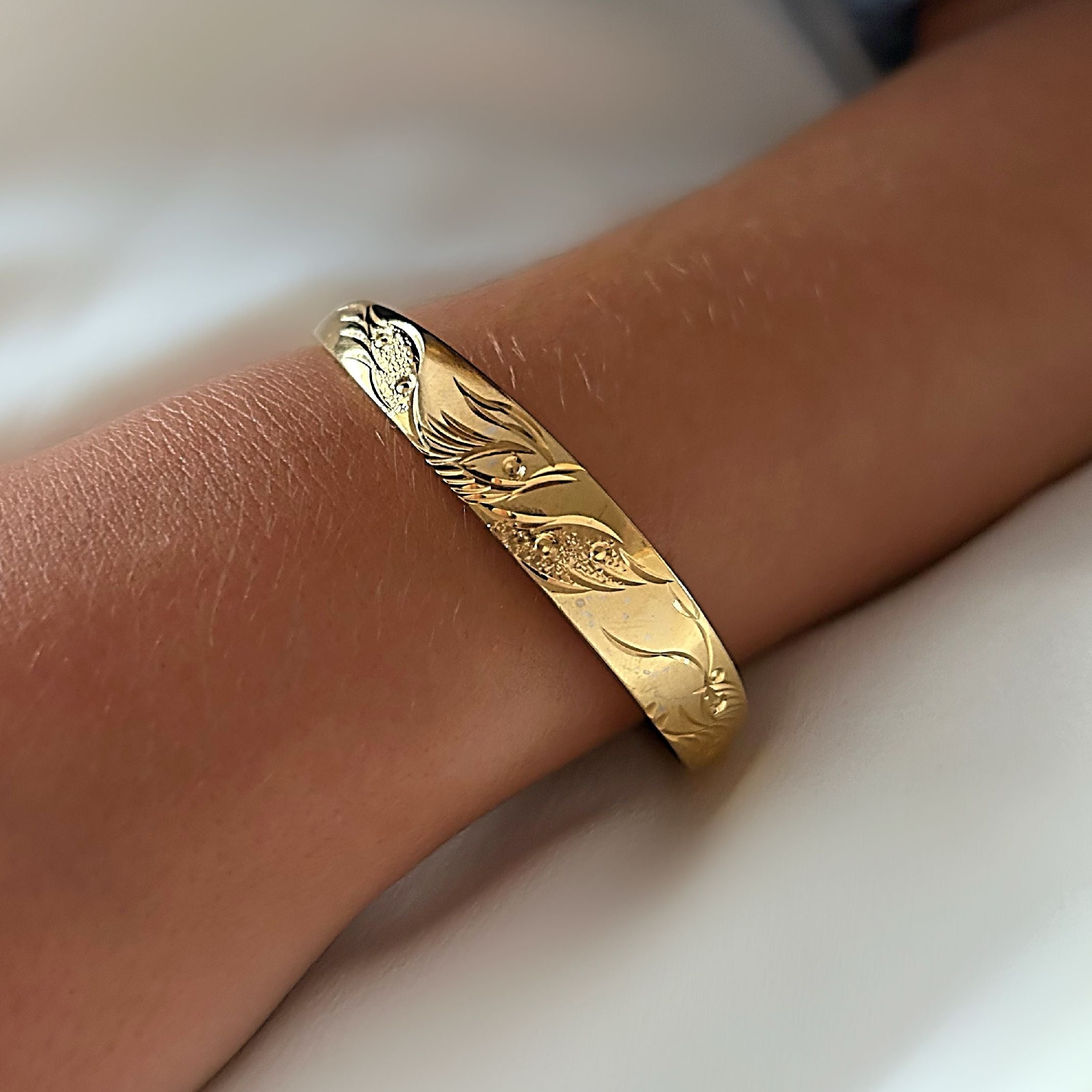 Gold phoenix bangle