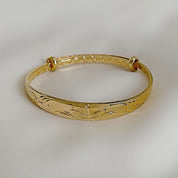 Gold lotus bangle
