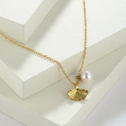 Gold mermaid tail necklace