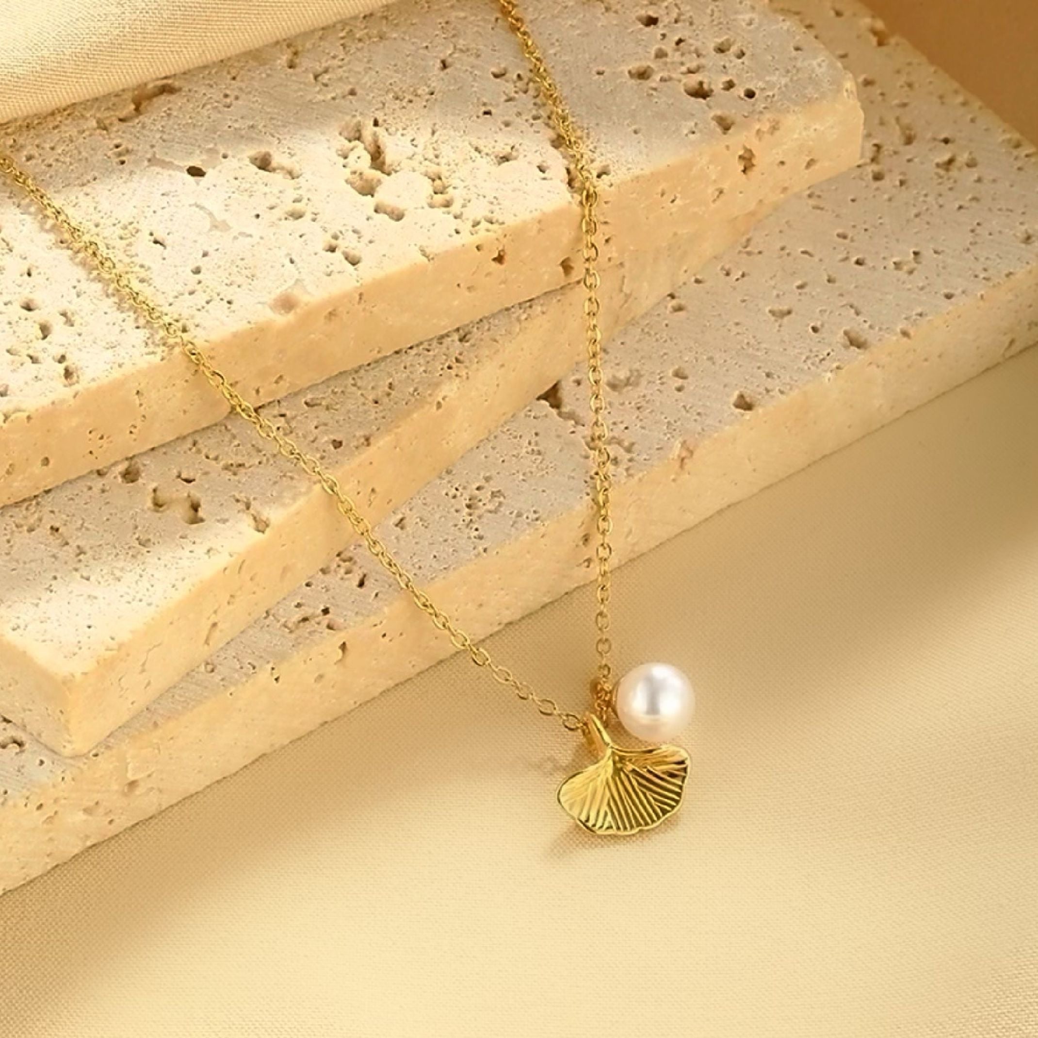 Gold mermaid tail necklace