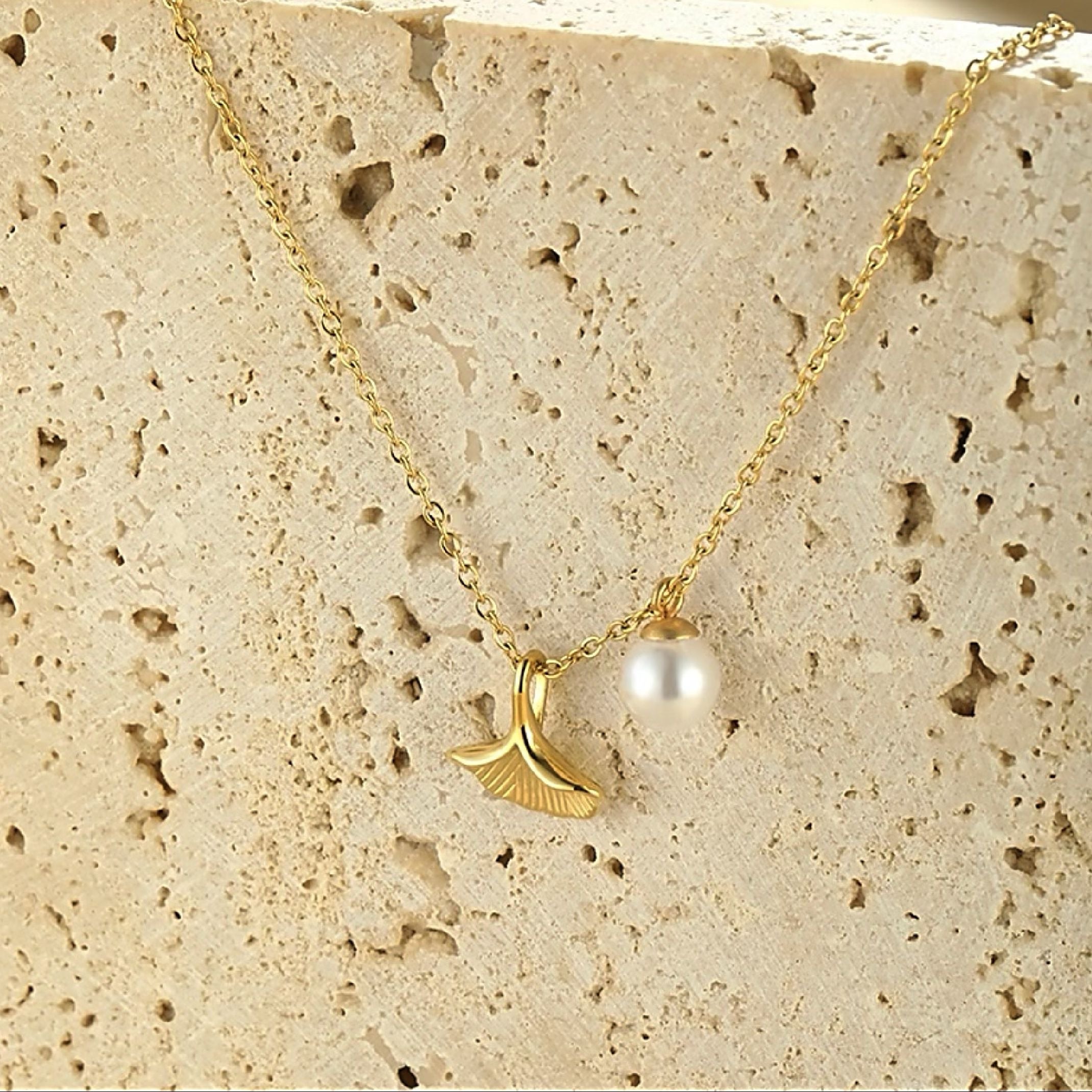 Gold mermaid tail necklace