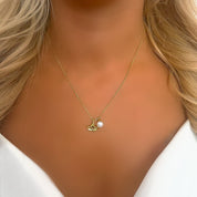 Gold mermaid tail necklace