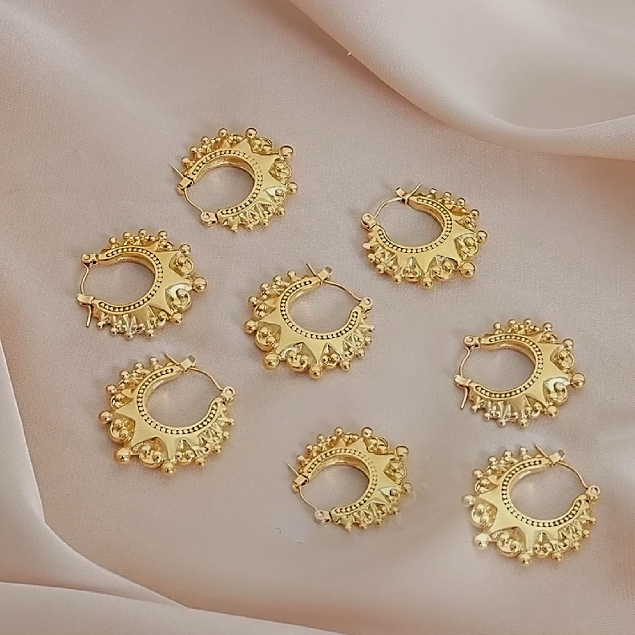 Gold creole earrings