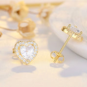 Gold heart stud earrings