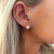 Gold heart stud earrings