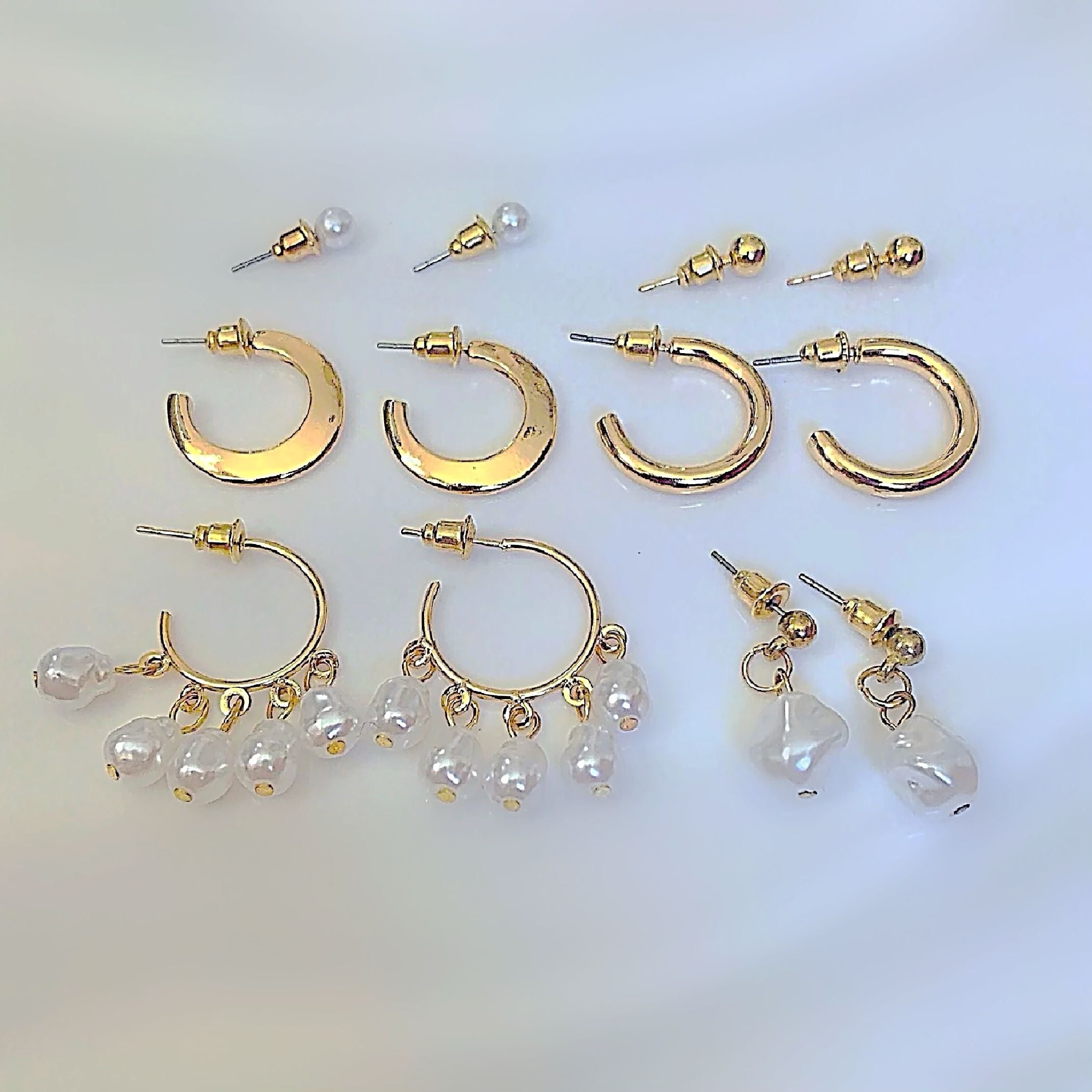 Hope and pearl earring stack