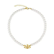 Gold orb pearl necklace