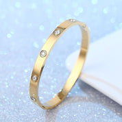 Diamanté dotted gold bangle