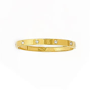 Diamanté dotted gold bangle