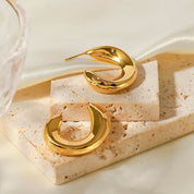 Gold curve hoop earrings