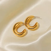 Gold curve hoop earrings 