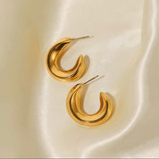 Gold curve hoop earrings