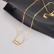 Gold pendant necklace