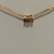 Rose gold Roman snakeskin necklace