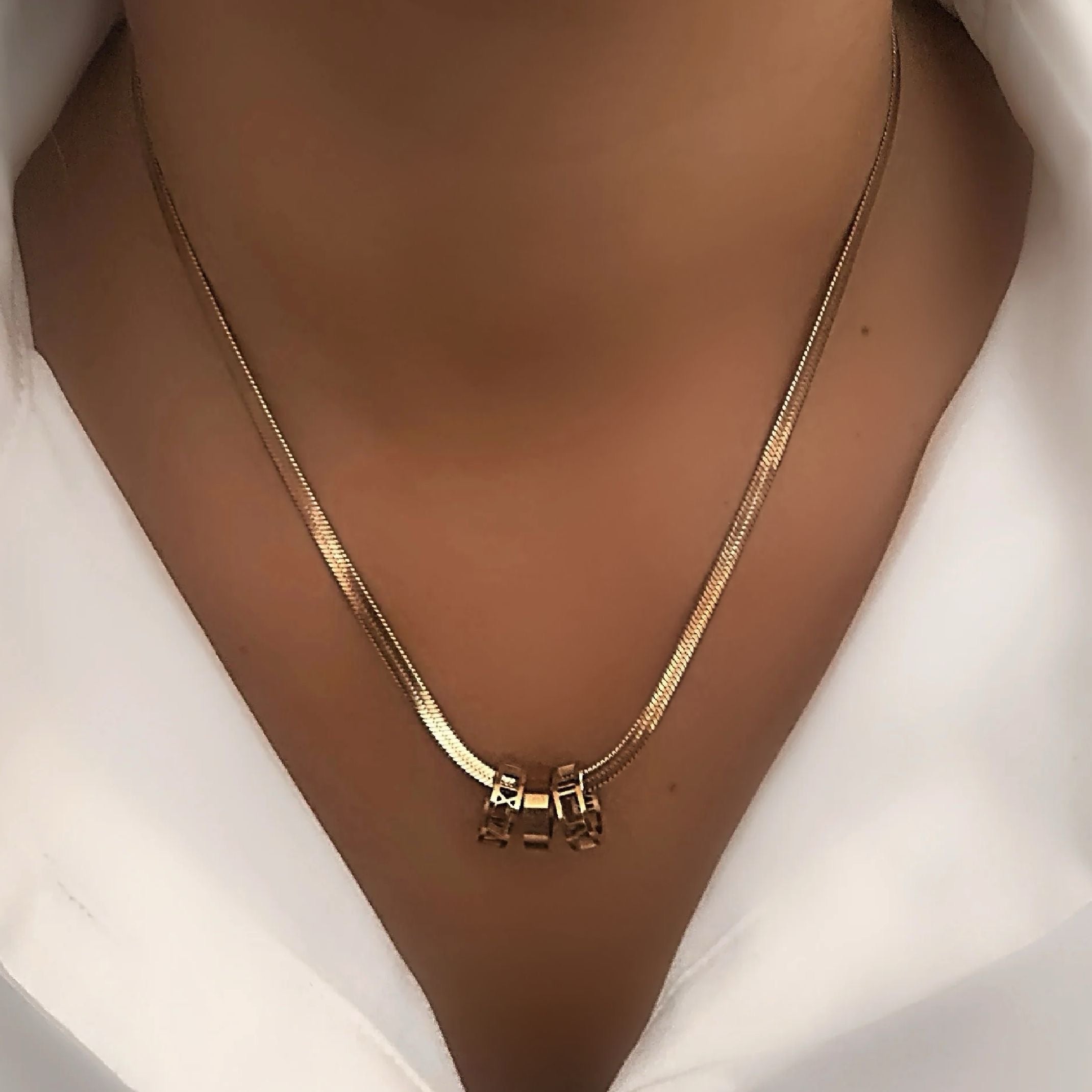 Rose gold Roman snakeskin necklace