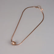 Rose gold Roman snakeskin necklace