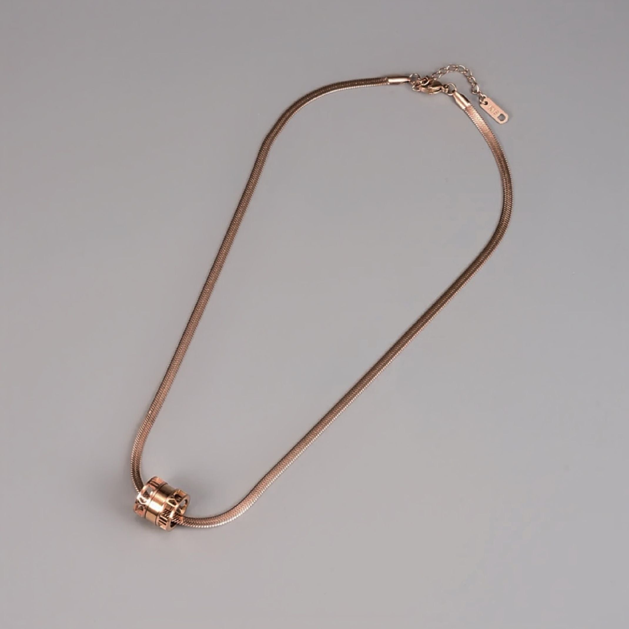 Rose gold Roman snakeskin necklace