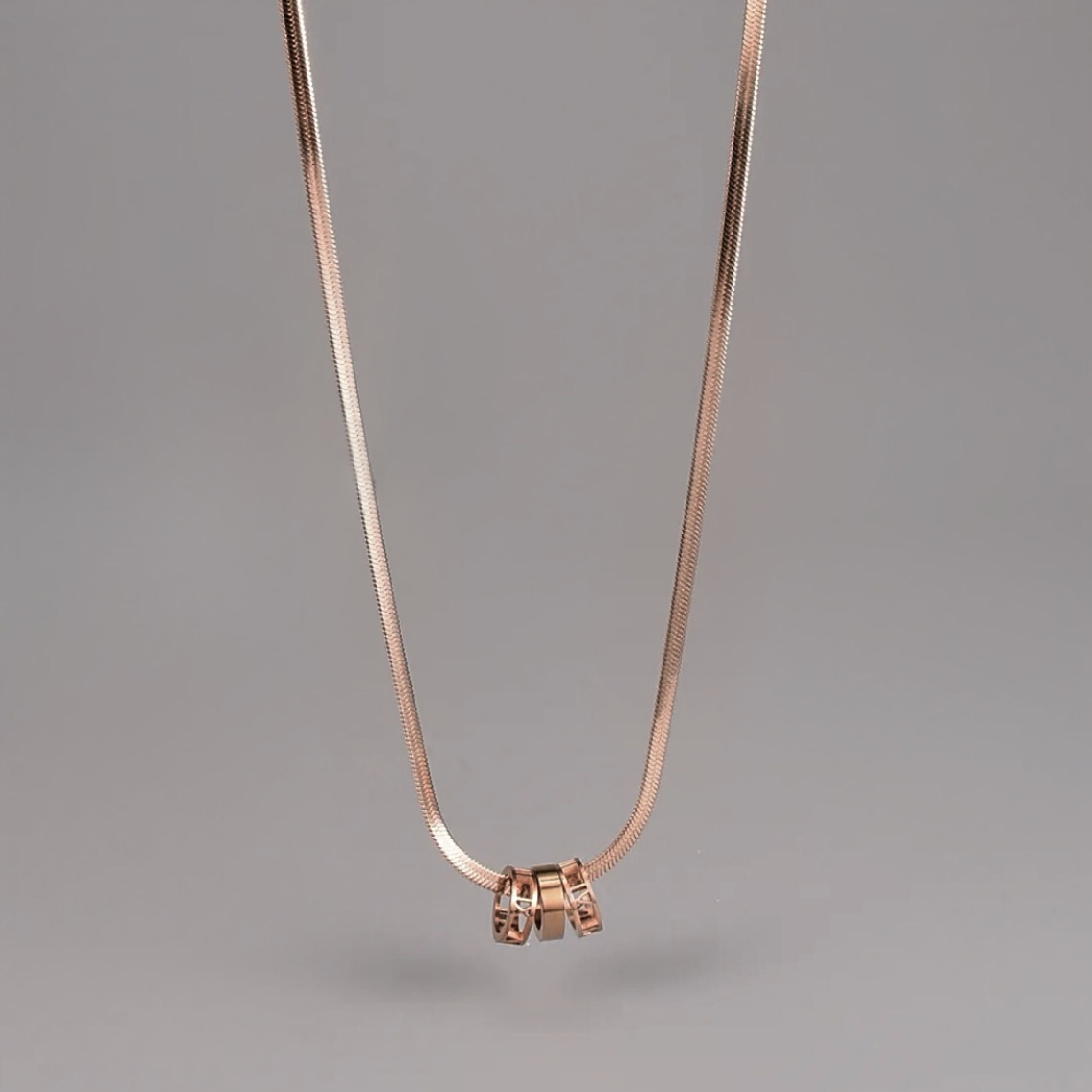 Rose gold Roman snakeskin necklace