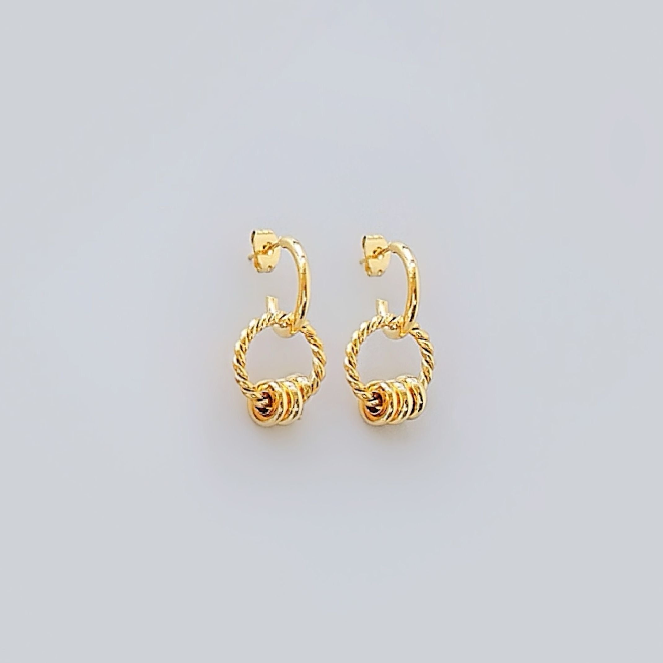 Gold triple ring earrings 