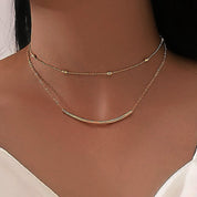 Gold bead chain layered