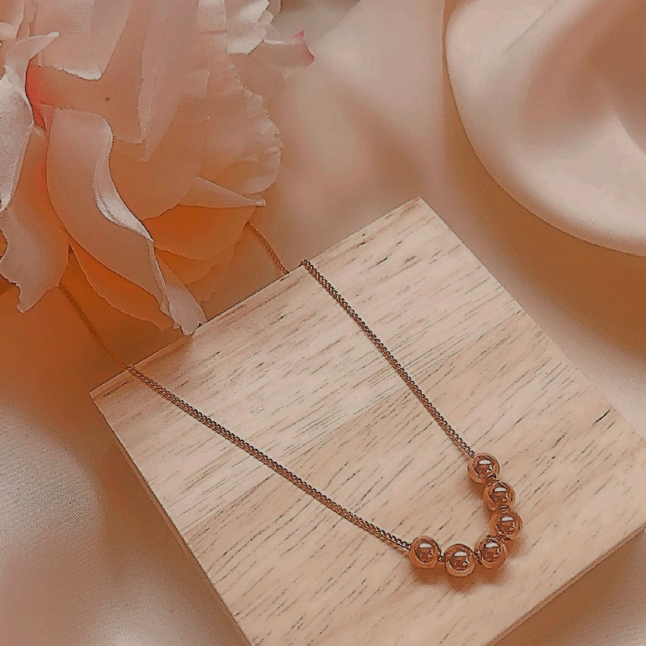 Rose gold ball necklace 