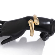 Gold crossover bangle
