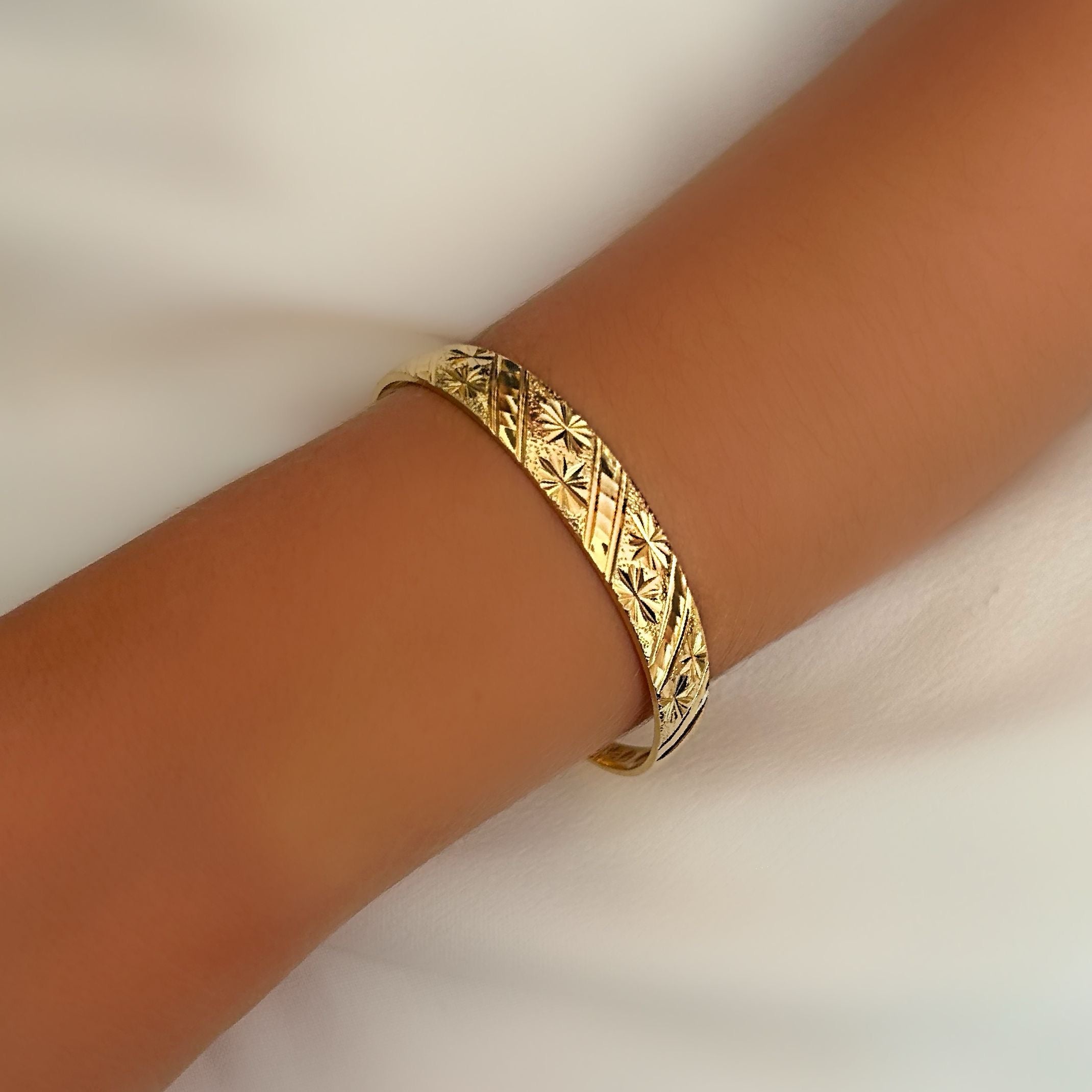 Gold bangle bracelet