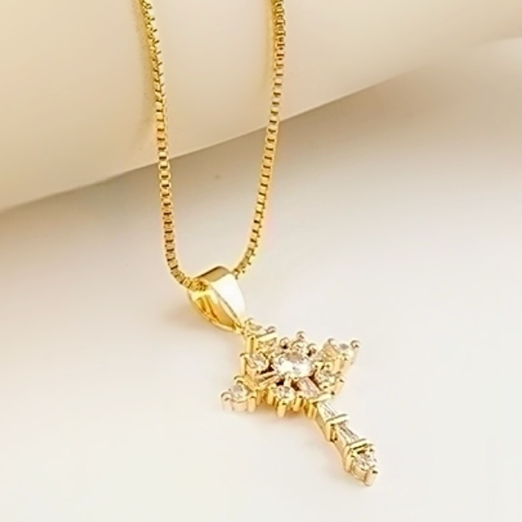 Gold cross necklace