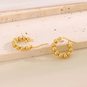 Gold bead hoop earrings 