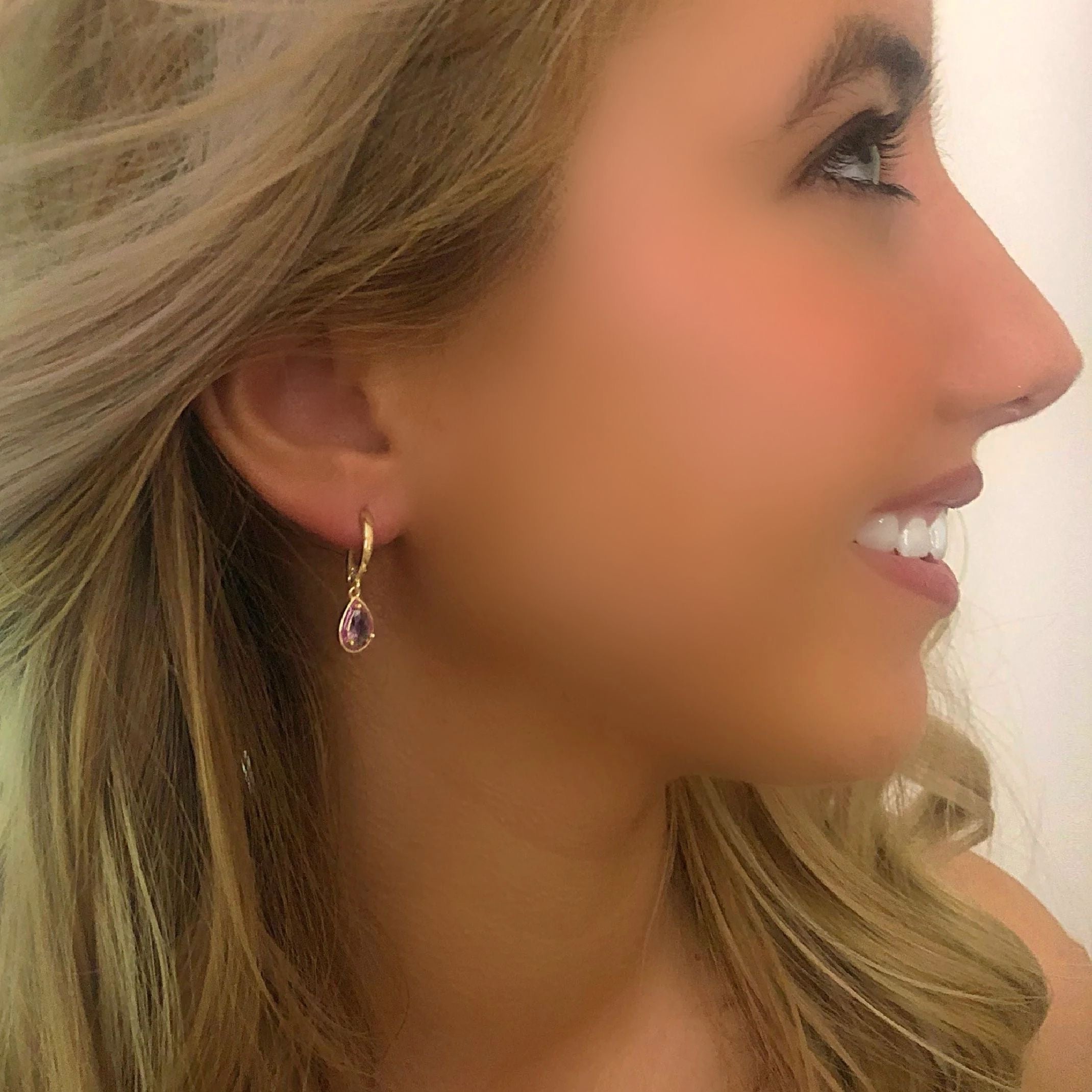 Purple huggie earrings
