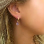 Purple huggie earrings