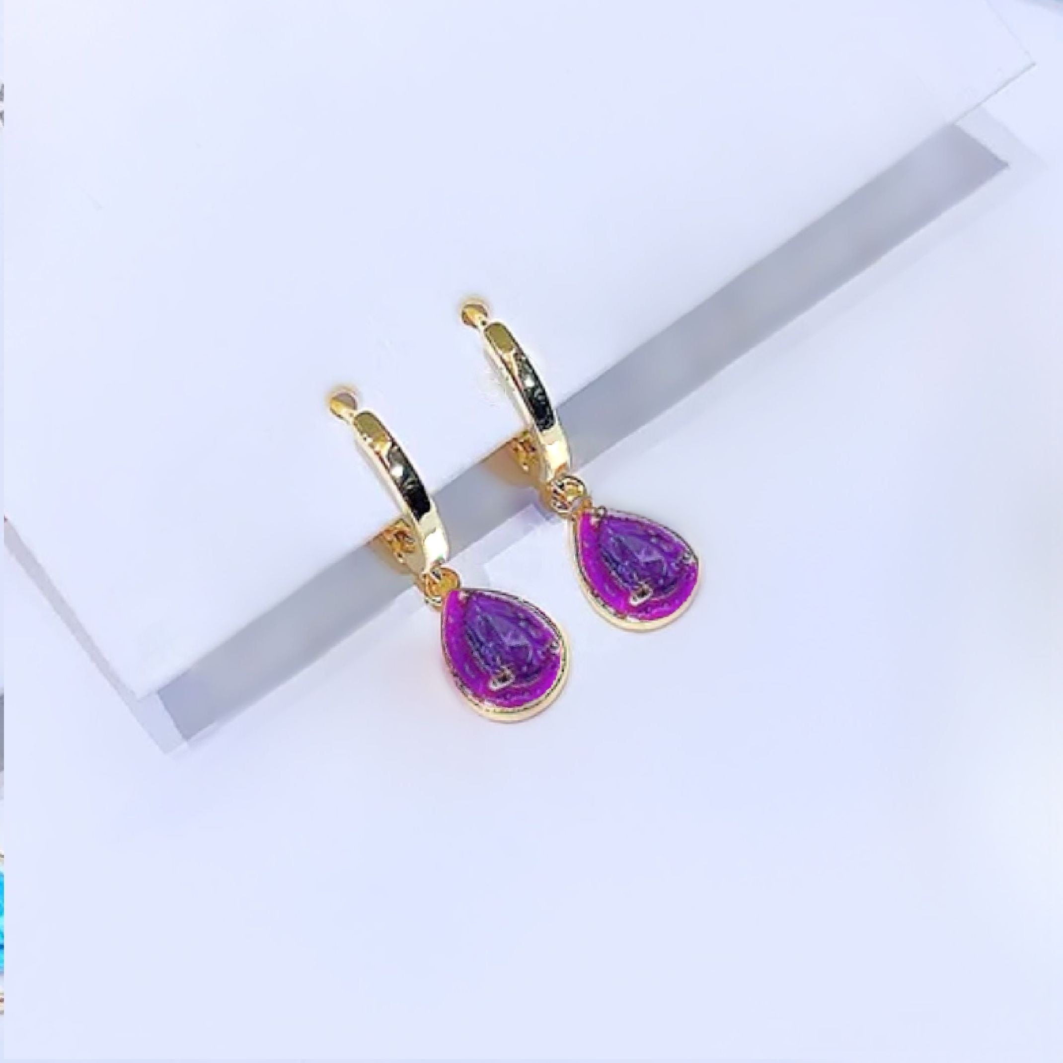 Purple huggie earrings 