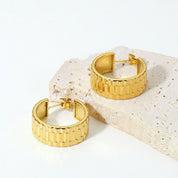 Gold watch strap earrings