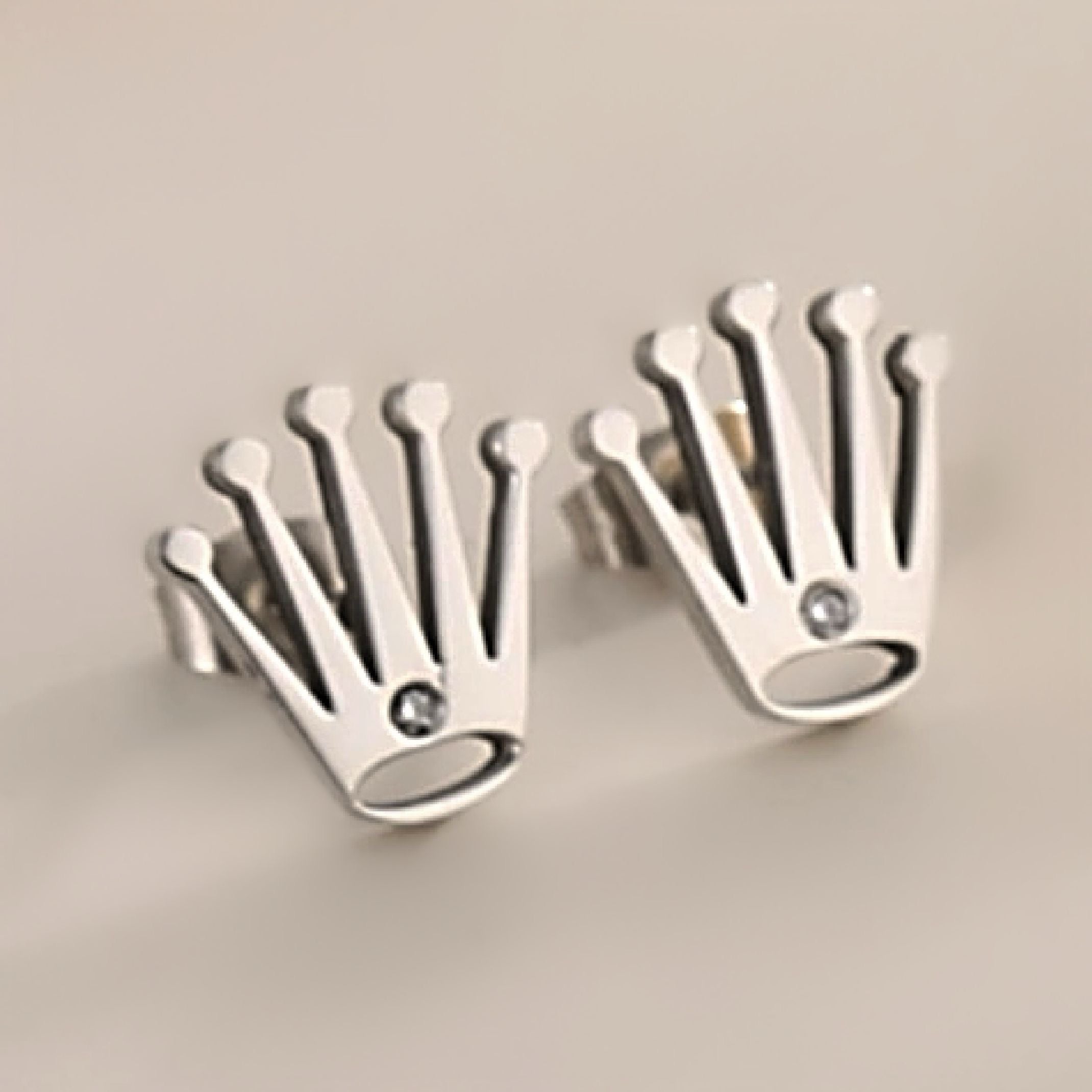 Silver crown stud earrings