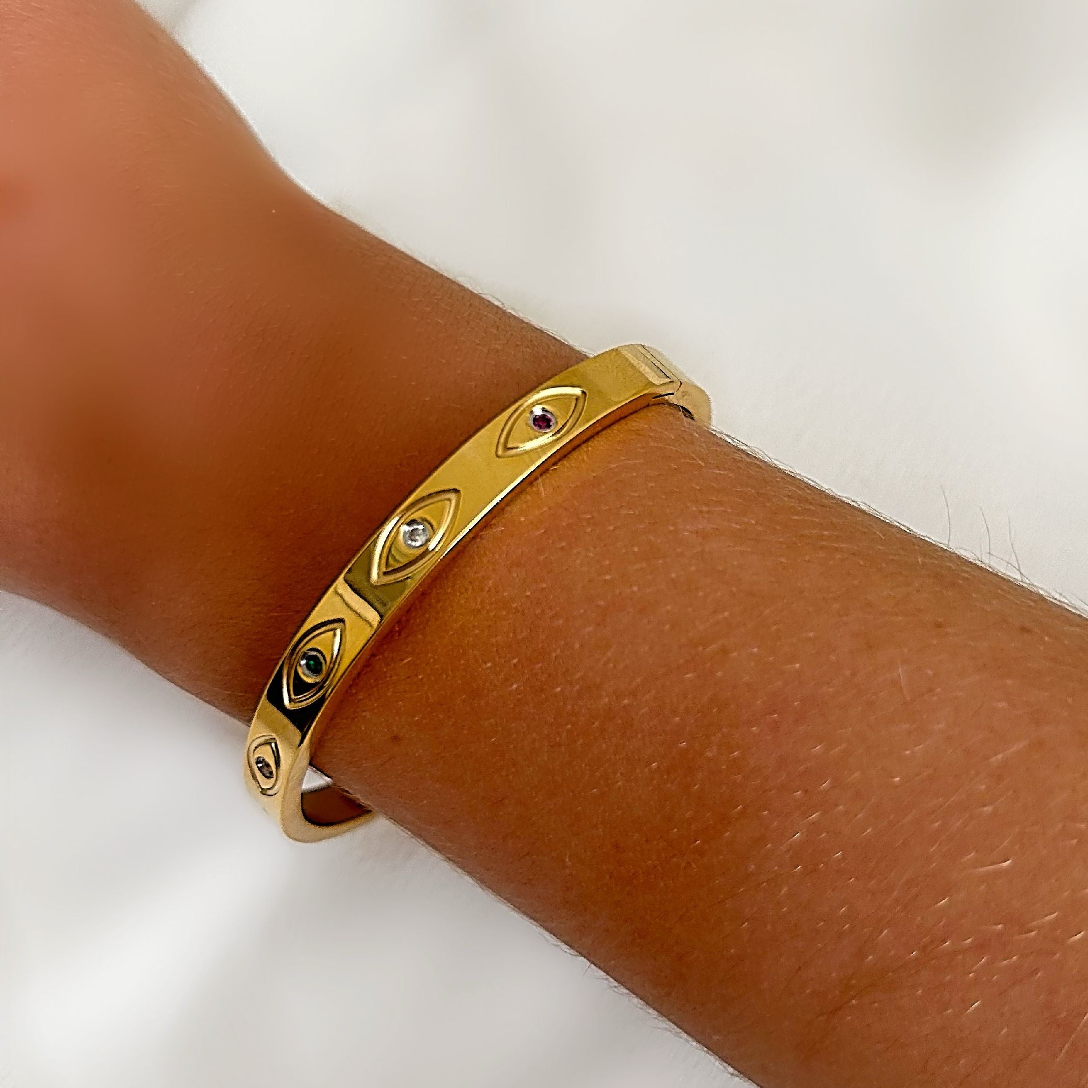 Gold evil eye bangle